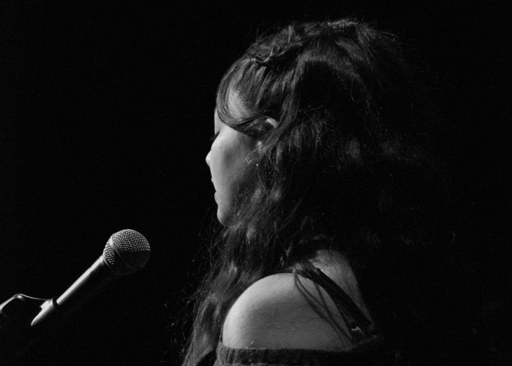 Singer performing with a microphone