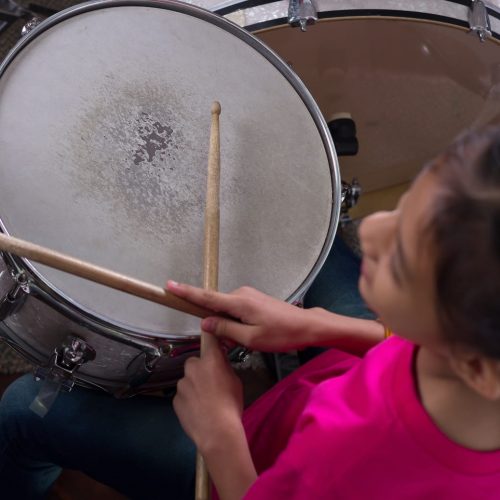 Young Girl Learning Drums Young Girl Learning Drums